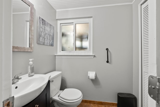 2923 Falcon Bridge Dr, Columbus, OH 43232 - half bathroom featuring toilet, crown molding, and vanity