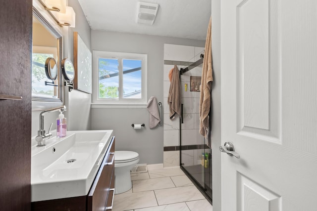 2923 Falcon Bridge Dr, Columbus, OH 43232 - bathroom featuring a shower stall, vanity, toilet, and baseboards