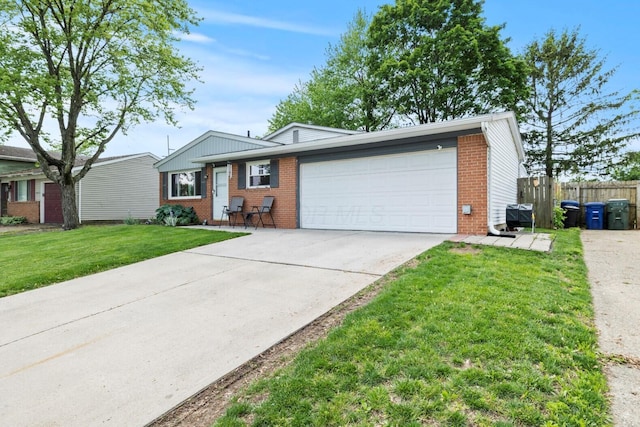 2923 Falcon Bridge Dr, Columbus, OH 43232 - single story home with brick siding, a garage, and concrete driveway