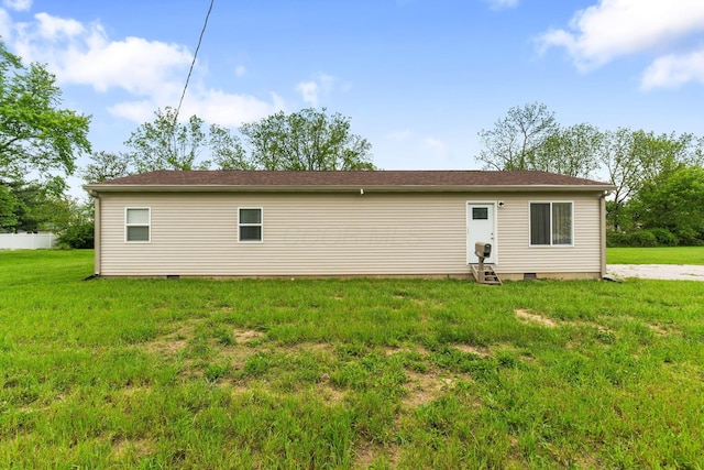 145 Sara Ave, Marion, OH 43302 - back of house featuring entry steps, crawl space, and a lawn