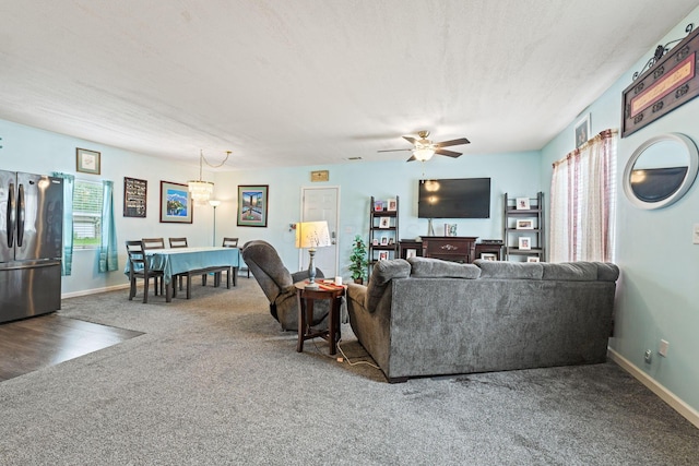 145 Sara Ave, Marion, OH 43302 - carpeted living area featuring a ceiling fan and baseboards