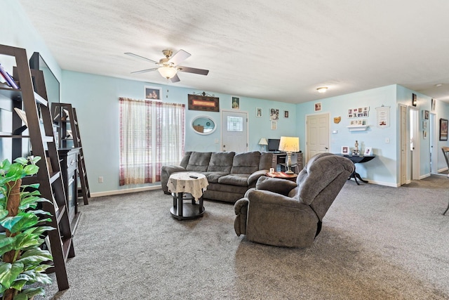 145 Sara Ave, Marion, OH 43302 - carpeted living room featuring ceiling fan and baseboards