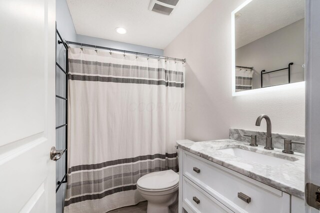 7834 Avaleen Cir N, Dublin, OH 43016 - bathroom featuring toilet, vanity, and a shower with shower curtain