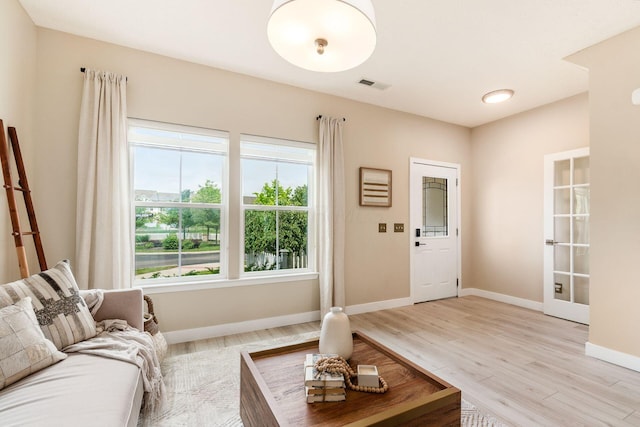 7834 Avaleen Cir N, Dublin, OH 43016 - living room featuring light wood-type flooring and baseboards