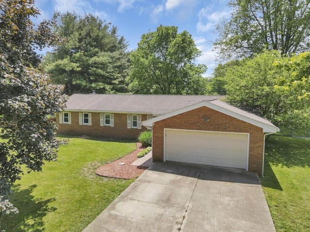 ranch-style home with brick siding, a front lawn, driveway, and an attached garage
