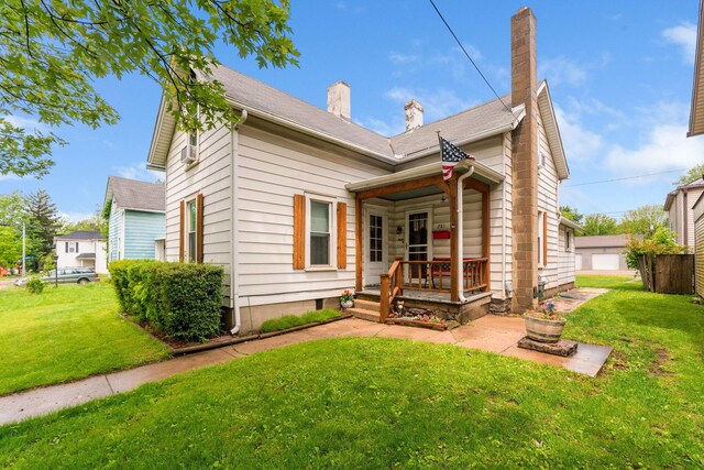 281 E Central Ave, Delaware, OH 43015 - view of front of property featuring a chimney and a patio area