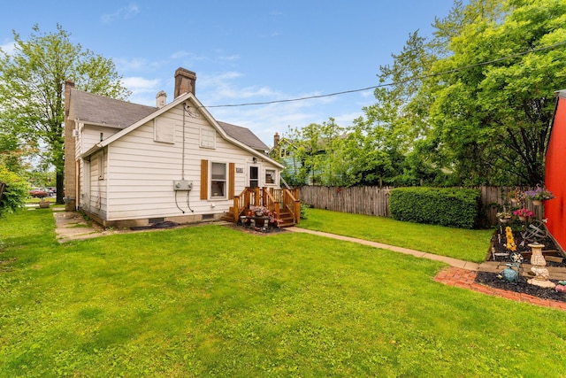 281 E Central Ave, Delaware, OH 43015 - back of house with a chimney