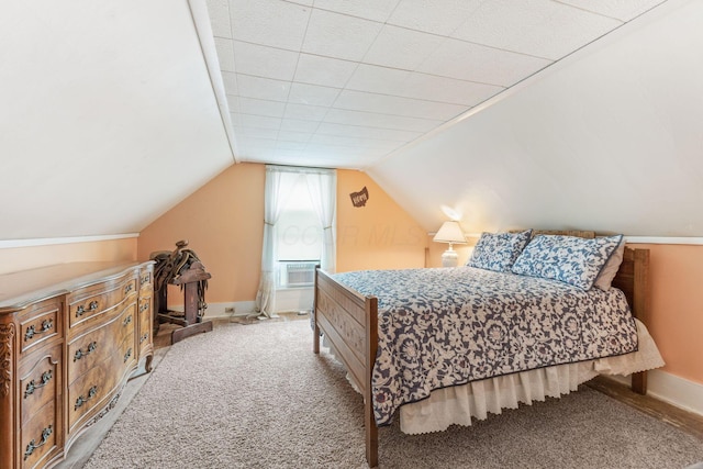 281 E Central Ave, Delaware, OH 43015 - carpeted bedroom with baseboards and lofted ceiling