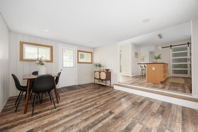 1366 Dyer Rd, Grove City, OH 43123 - dining room featuring a barn door and light wood finished floors