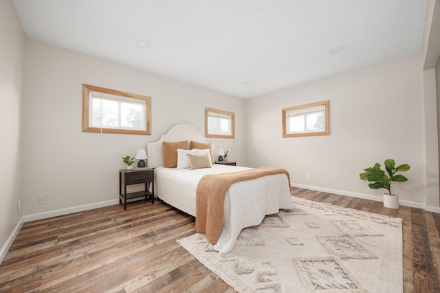 1366 Dyer Rd, Grove City, OH 43123 - bedroom featuring baseboards and wood finished floors