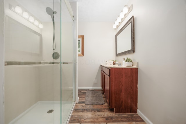 1366 Dyer Rd, Grove City, OH 43123 - bathroom with a shower stall, wood finished floors, and baseboards