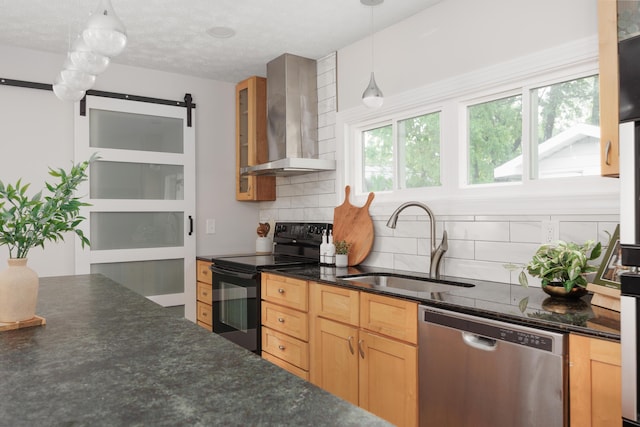 1366 Dyer Rd, Grove City, OH 43123 - kitchen with stainless steel dishwasher, black range with electric cooktop, wall chimney range hood, a sink, and a barn door