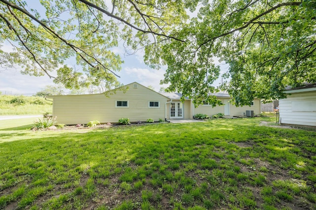1366 Dyer Rd, Grove City, OH 43123 - back of property with french doors and a lawn