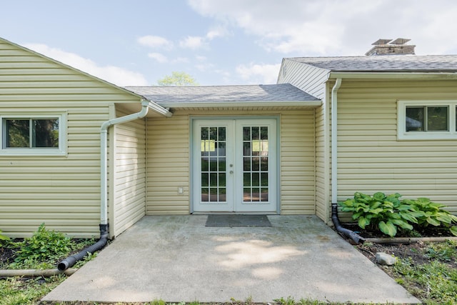1366 Dyer Rd, Grove City, OH 43123 - entrance to property featuring french doors, a patio area, and a shingled roof