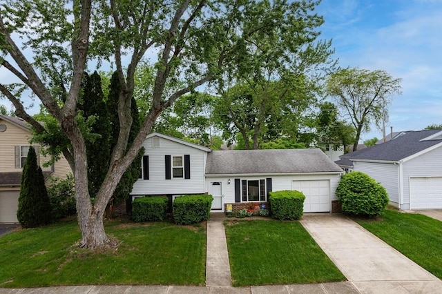 5965 Lucky Charm Dr, Galloway, OH 43119 - split level home with driveway, a front yard, and a garage