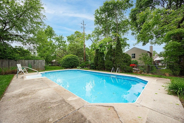 5965 Lucky Charm Dr, Galloway, OH 43119 - view of swimming pool with a fenced backyard and a patio