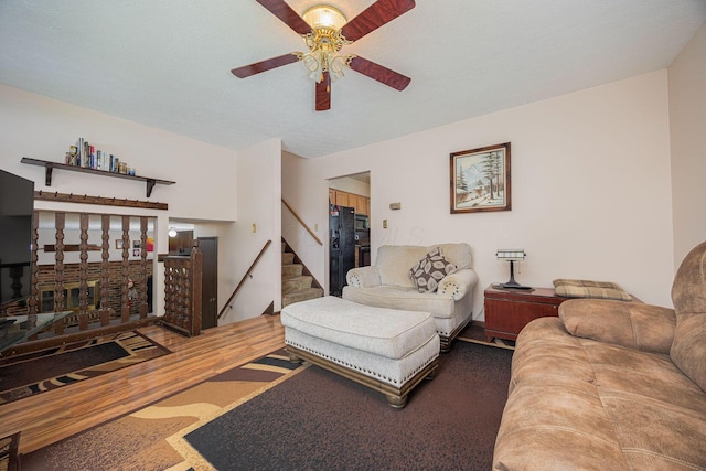 5965 Lucky Charm Dr, Galloway, OH 43119 - living area featuring ceiling fan and stairway