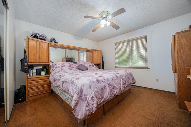 5965 Lucky Charm Dr, Galloway, OH 43119 - carpeted bedroom with a textured ceiling and ceiling fan