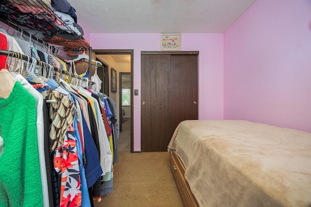 5965 Lucky Charm Dr, Galloway, OH 43119 - carpeted bedroom featuring a textured ceiling