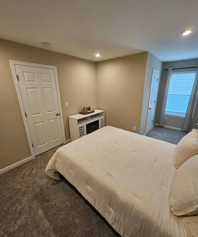 7540 Twisted Bark Dr, Canal Winchester, OH 43110 - bedroom with dark colored carpet, baseboards, and recessed lighting