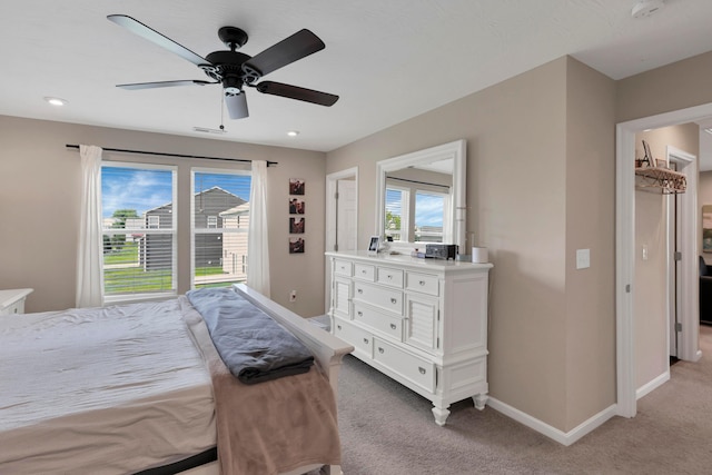 7540 Twisted Bark Dr, Canal Winchester, OH 43110 - bedroom with light carpet, multiple windows, and a ceiling fan