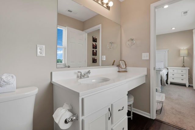 7540 Twisted Bark Dr, Canal Winchester, OH 43110 - bathroom featuring vanity and wood finished floors
