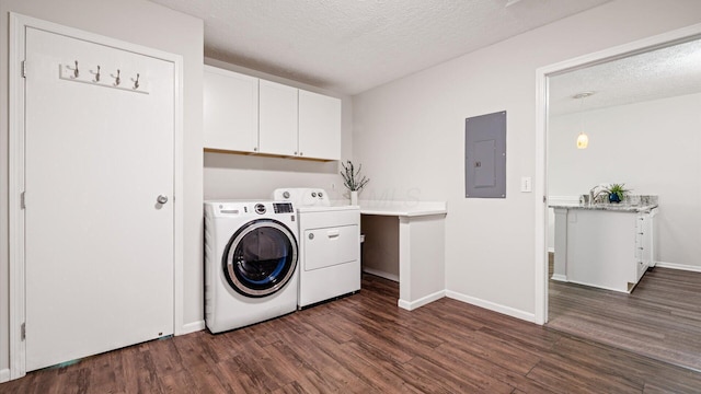 6706 Axtel Dr Unit 7A, Canal Winchester, OH 43110 - laundry room featuring electric panel, cabinet space, washing machine and clothes dryer, dark wood finished floors, and a textured ceiling
