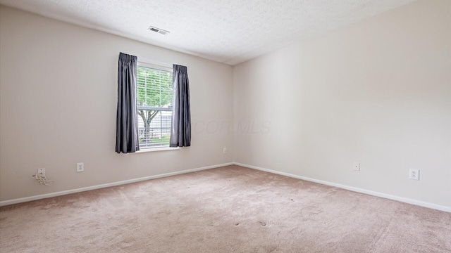 6706 Axtel Dr Unit 7A, Canal Winchester, OH 43110 - unfurnished room featuring carpet, baseboards, and a textured ceiling