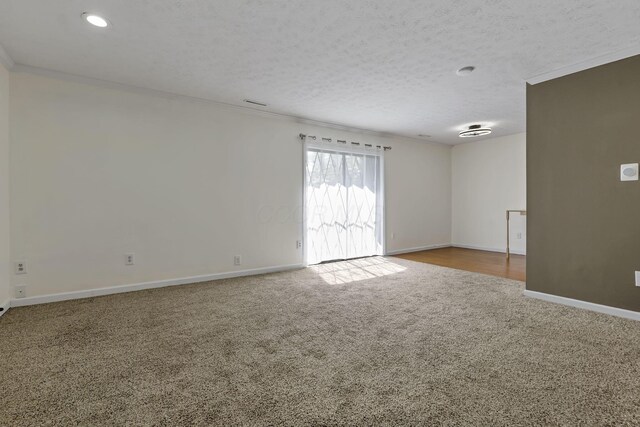 625 Country Club Dr Unit E4, Newark, OH 43055 - unfurnished room with carpet flooring, crown molding, baseboards, a textured ceiling, and recessed lighting