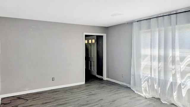 1236 Lindenwood Rd N, Columbus, OH 43229 - spare room featuring wood finished floors and baseboards