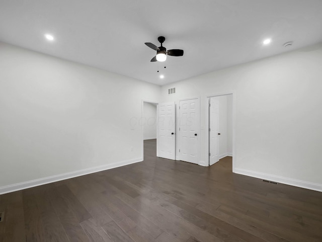 1292 Moundview Ave, Columbus, OH 43207 - unfurnished bedroom with baseboards, dark wood finished floors, recessed lighting, and ceiling fan