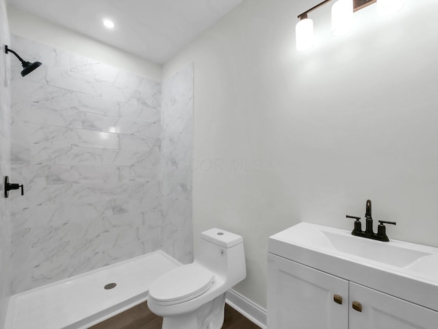 1292 Moundview Ave, Columbus, OH 43207 - full bathroom featuring toilet, vanity, and a stall shower