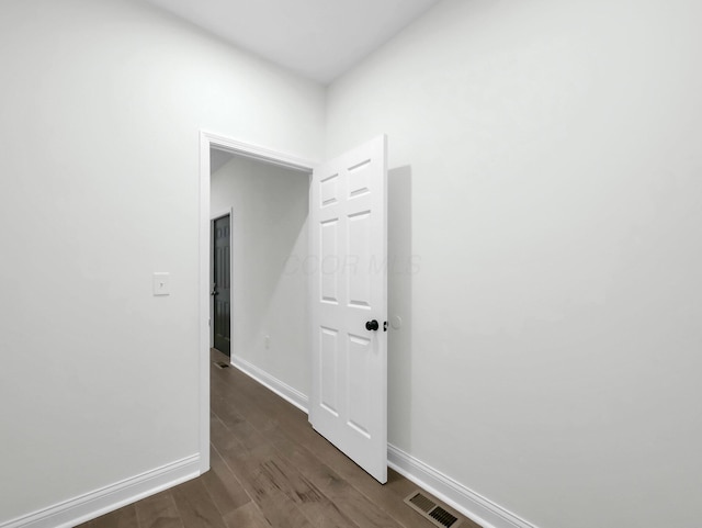 1292 Moundview Ave, Columbus, OH 43207 - hallway with dark wood finished floors and baseboards