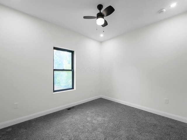 1292 Moundview Ave, Columbus, OH 43207 - unfurnished room with dark colored carpet, baseboards, ceiling fan, and recessed lighting