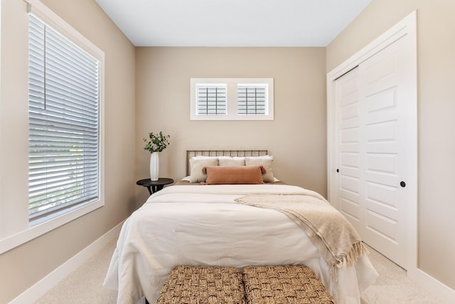 5599 Piatt Rd, Lewis Center, OH 43035 - carpeted bedroom featuring multiple windows and a closet