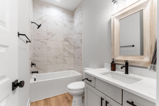 5599 Piatt Rd, Lewis Center, OH 43035 - full bath with vanity, wood finished floors, and shower / tub combination