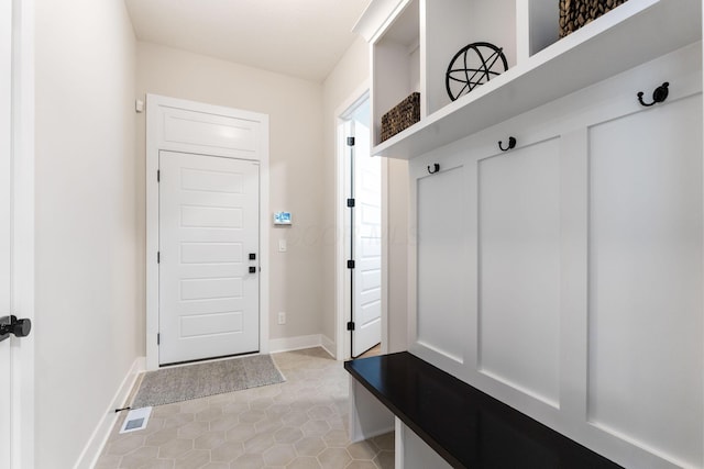 5599 Piatt Rd, Lewis Center, OH 43035 - mudroom with baseboards and light tile patterned flooring