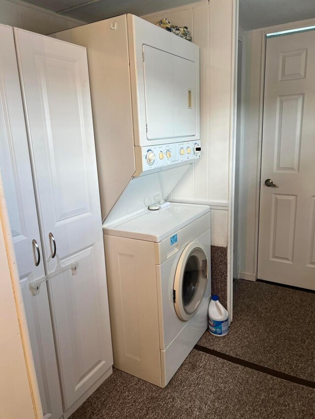 12030 Holly Dr Unit 31, Lakeview, OH 43331 - laundry room featuring stacked washer / drying machine