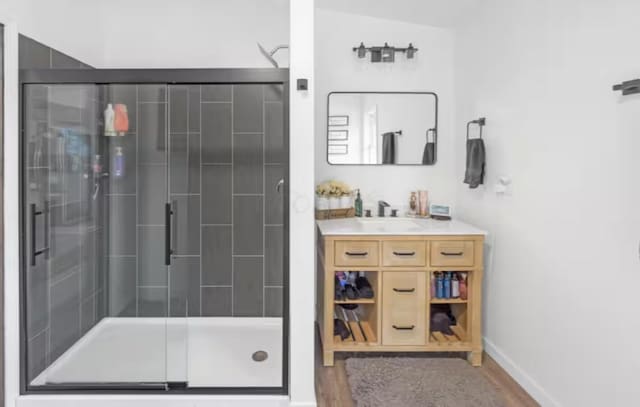 4320 Jacktown Rd, Ostrander, OH 43061 - full bath with a shower stall, vanity, and wood finished floors