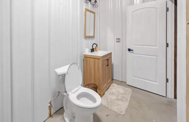 4320 Jacktown Rd, Ostrander, OH 43061 - bathroom featuring concrete floors, toilet, and vanity