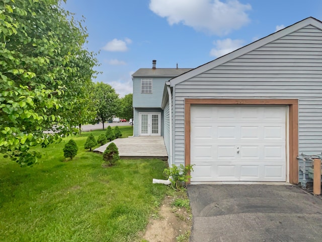 1813 Worthington Run Dr Unit A, Columbus, OH 43235 - garage featuring asphalt driveway and french doors