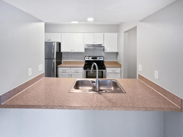 1813 Worthington Run Dr Unit A, Columbus, OH 43235 - kitchen featuring stainless steel appliances, under cabinet range hood, a sink, a peninsula, and recessed lighting