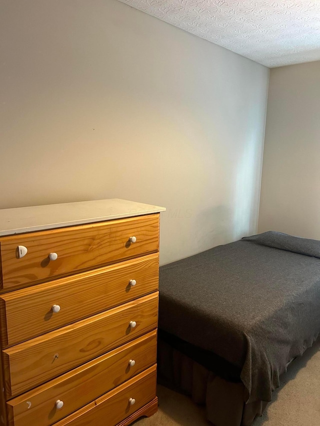 bedroom with a textured ceiling