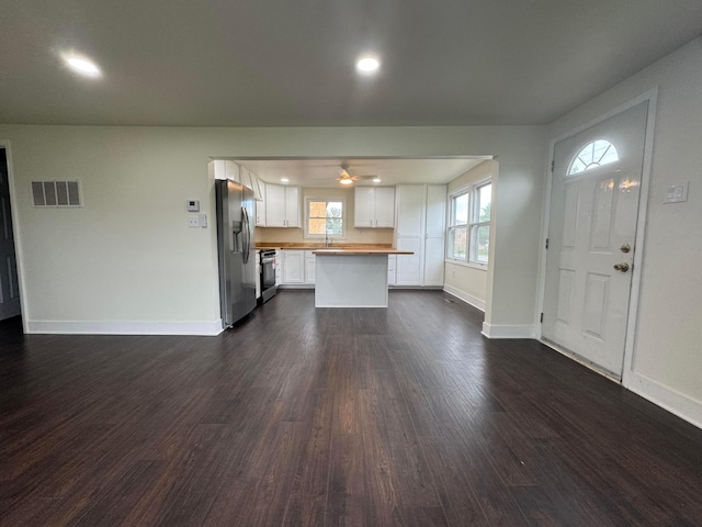 1227 Brown Rd, Columbus, OH 43223 - unfurnished living room with dark wood-style floors, a sink, baseboards, ceiling fan, and recessed lighting