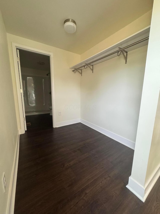 1227 Brown Rd, Columbus, OH 43223 - spacious closet with dark wood-style flooring