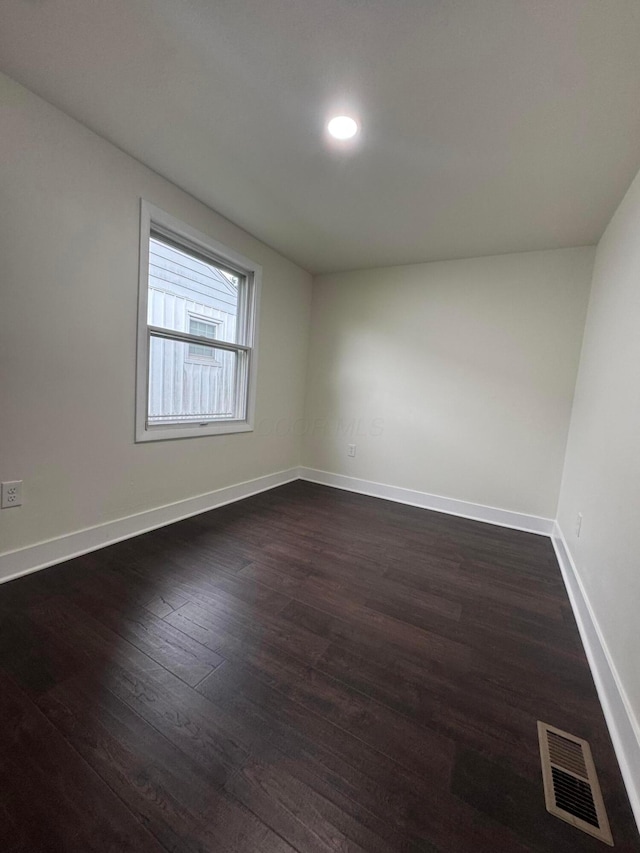 1227 Brown Rd, Columbus, OH 43223 - empty room with dark wood-style flooring, baseboards, and recessed lighting