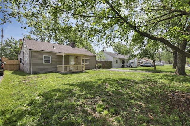 392 S Hampton Rd, Columbus, OH 43213 - rear view of house with a chimney and a deck