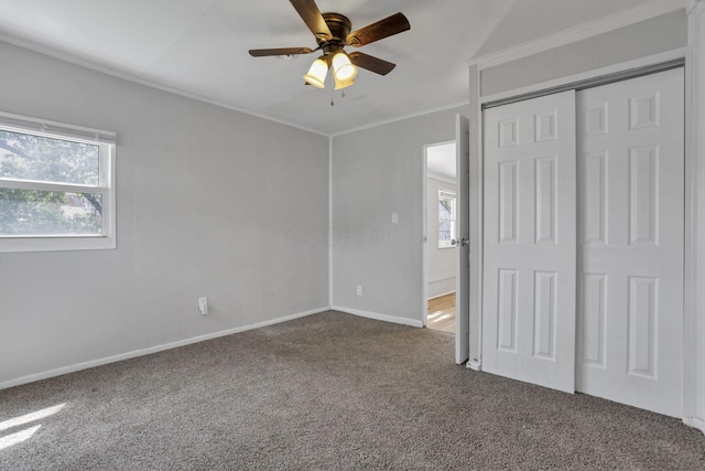 392 S Hampton Rd, Columbus, OH 43213 - unfurnished bedroom with carpet, baseboards, crown molding, a closet, and a ceiling fan