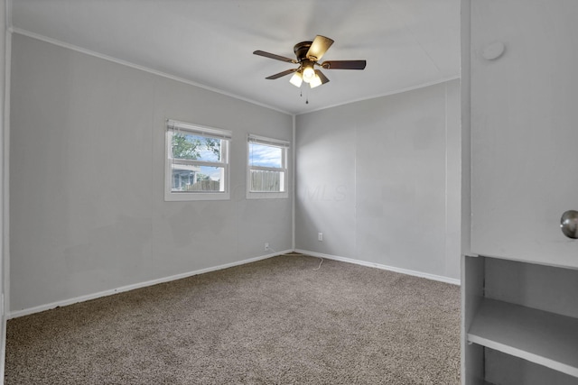 392 S Hampton Rd, Columbus, OH 43213 - carpeted spare room with ceiling fan, ornamental molding, and baseboards