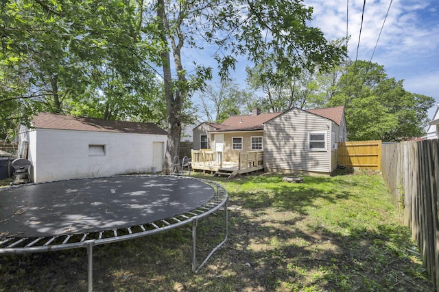 392 S Hampton Rd, Columbus, OH 43213 - view of yard with a trampoline and a deck